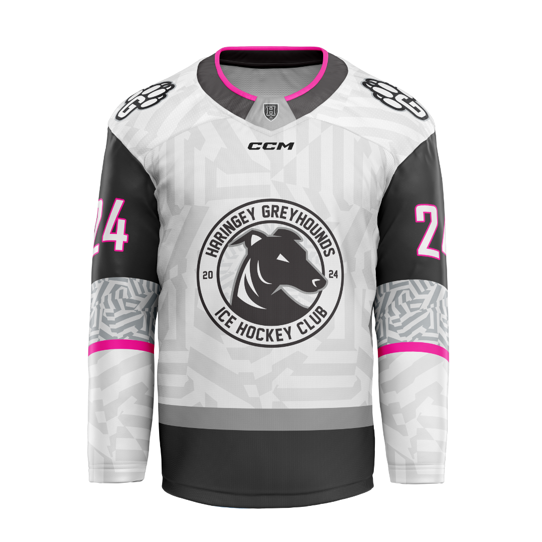 The Greyhounds 25/26 Light Jersey (NAMED) from Haringey Huskies Store is a gray and black jersey with pink accents, club logo, paw prints on the shoulders, and the number 24 on both sleeves.