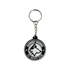 Presenting the Huskies Keyring from the Haringey Huskies Store—a round keyring showcasing the official club logo with a striking wolf head design and bold black and white text. The year 2017 appears on either side of the wolf’s head, making this keyring an ideal accessory for any dedicated Haringey Huskies Ice Hockey Club fan.