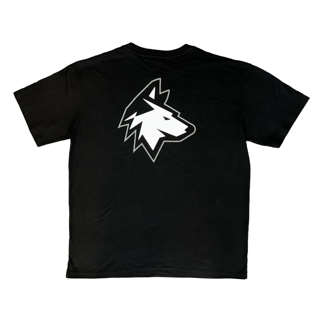 Haringey Huskies Store’s "Huskies Oversized T-Shirt Black" features a large white stylized wolf head logo centered on the back, displayed against a white background.